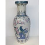 A floor standing vase (umbrella stand) having Oriental influence pattern upon, standing 62.5cm high.