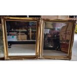 A pair of fine bevel edged mirrors in gilt painted frames, each measuring approx 59 x 49cm overall.