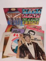 A collection of LP records including Rolling Stones Some Girls, Ringo Starr self-titled album,