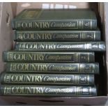 A quantity of The Country Companion magazines in folders.