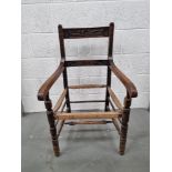 An oak carver chair for re upholstery.