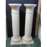 A pair of contemporary pillars painted marble effect (chipped), each standing 114cm high.
