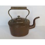 A copper kettle, approx 29cm to spout.