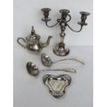 A silver plated three sconce candelabra together with 2 large silver plated ladles,