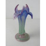 A hand blown Art Glass vase in the form of a flower standing 21cm high.