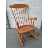 A pine rocking chair.