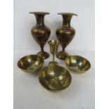 Three brass bowls together with a bud vase and a pair of brass vases (one /a/f).
