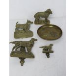 A brass English Setter door knocker together with another similar smaller,