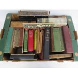 A quantity of vintage books including The Earth by Higgins, Proven Remedies by JH Oliver,