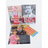Two autographed John Challis books together with an autographed photograph and ticket stub.