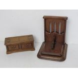 An oak desk top letter holder together with a music box by Tallent of Old Bond Street London.