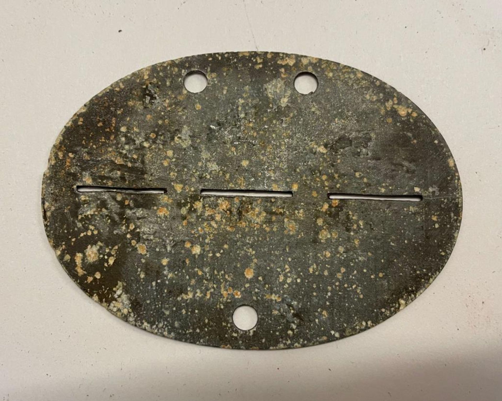 A WWII German dog tag. This lot will be available to collect in person 48 hours after the end of the - Image 2 of 3