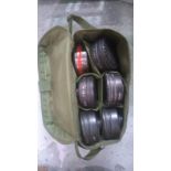 Twelve British gas mask filters in original transit bag. This lot will be available to collect in