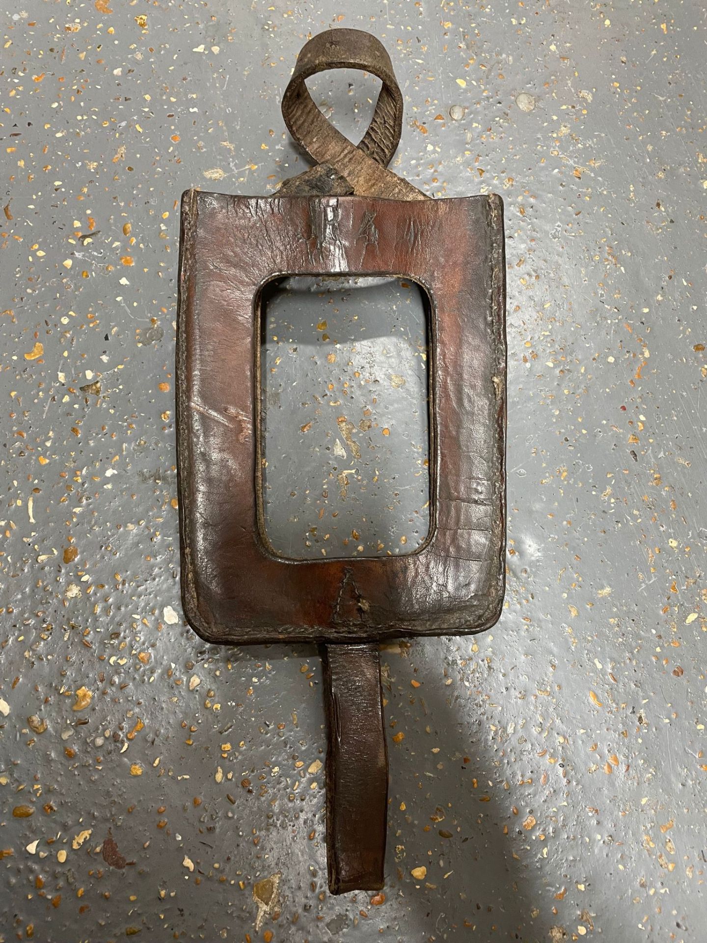 A WWI leather case for a German entrenching tool. This lot will be available to collect in person 48