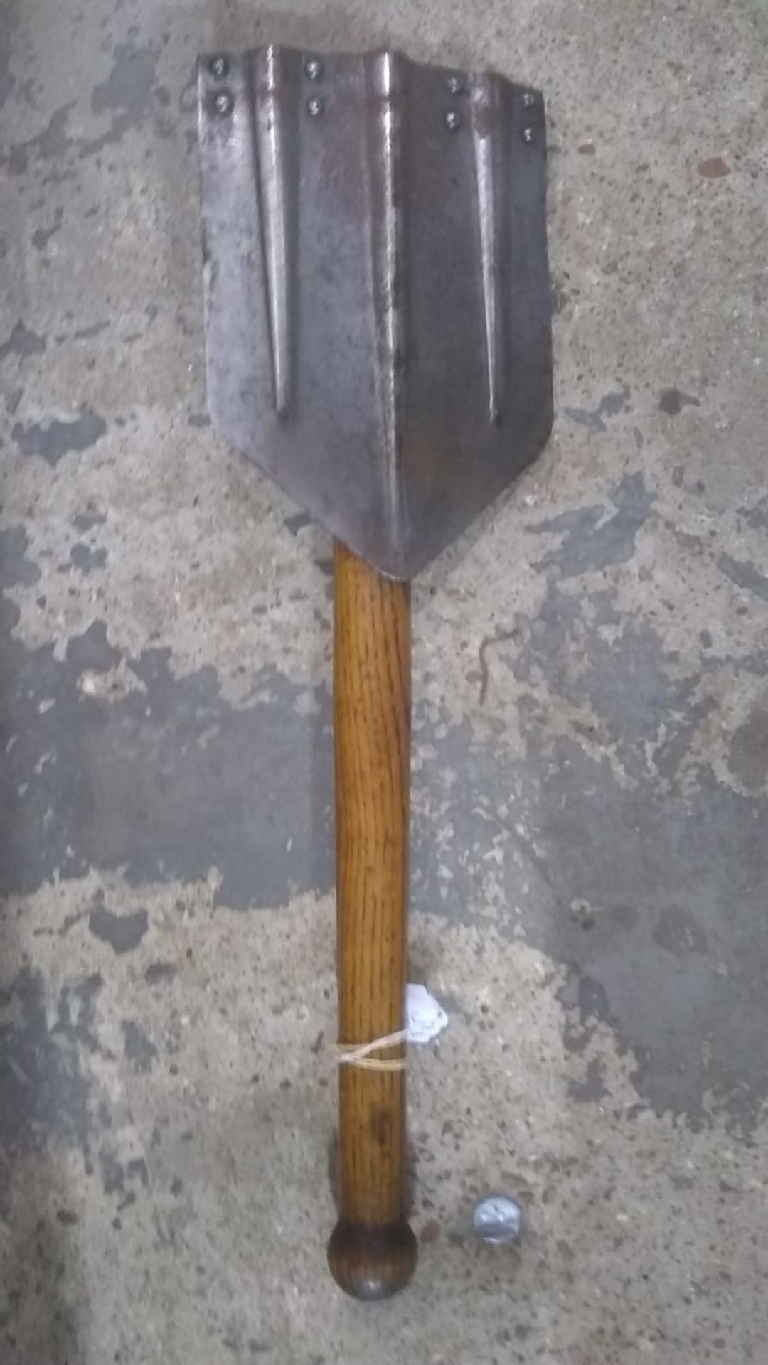 A WWII German folding entrenching tool. This lot will be available to collect in person 48 hours - Image 2 of 3