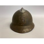 A French civil defence M26 Adrian helmet. This lot will be available to collect in person 48 hours