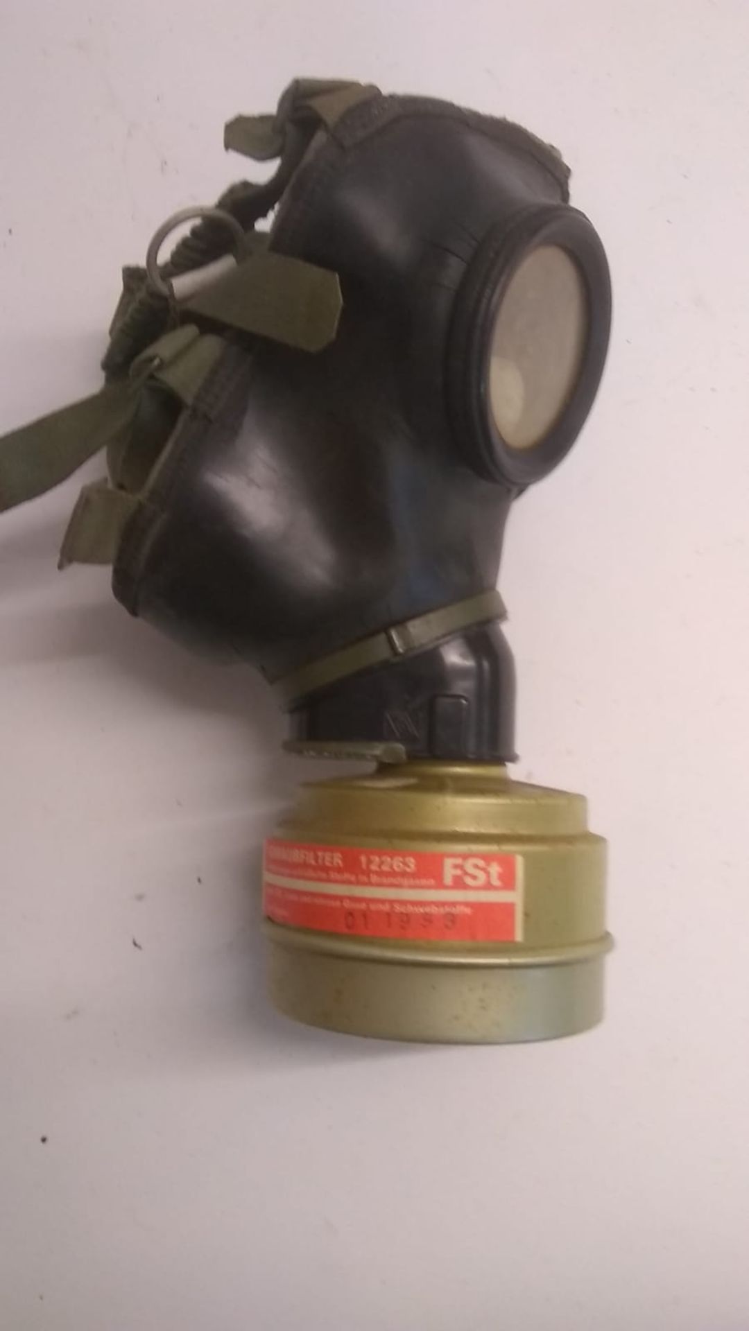 A WWII German Volksgasmaske (silver filter) gas mask, together with a rare East German MEDI gas mask - Image 2 of 9