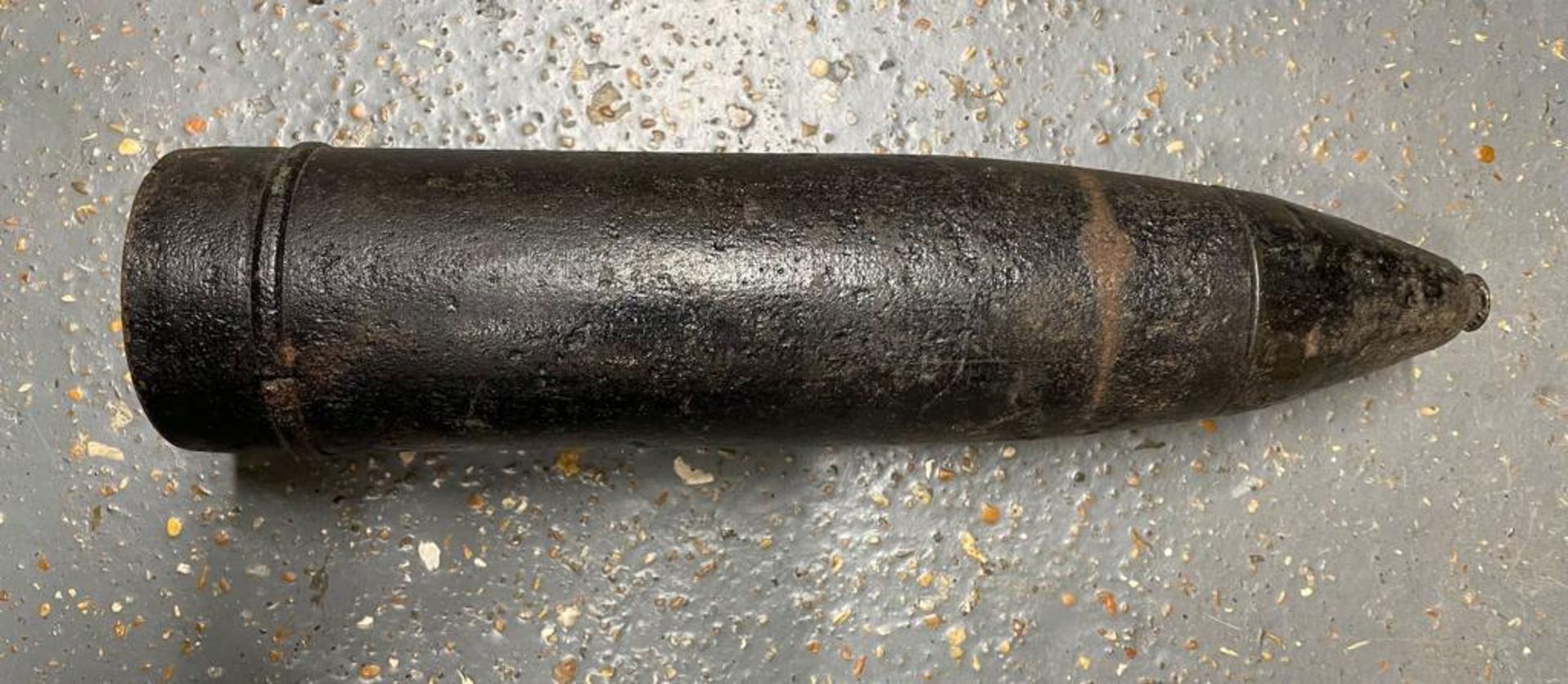 An inert WWII German 7.5cm projectile with fuse. This lot will be available to collect in person