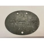 A WWII German dog tag. This lot will be available to collect in person 48 hours after the end of the
