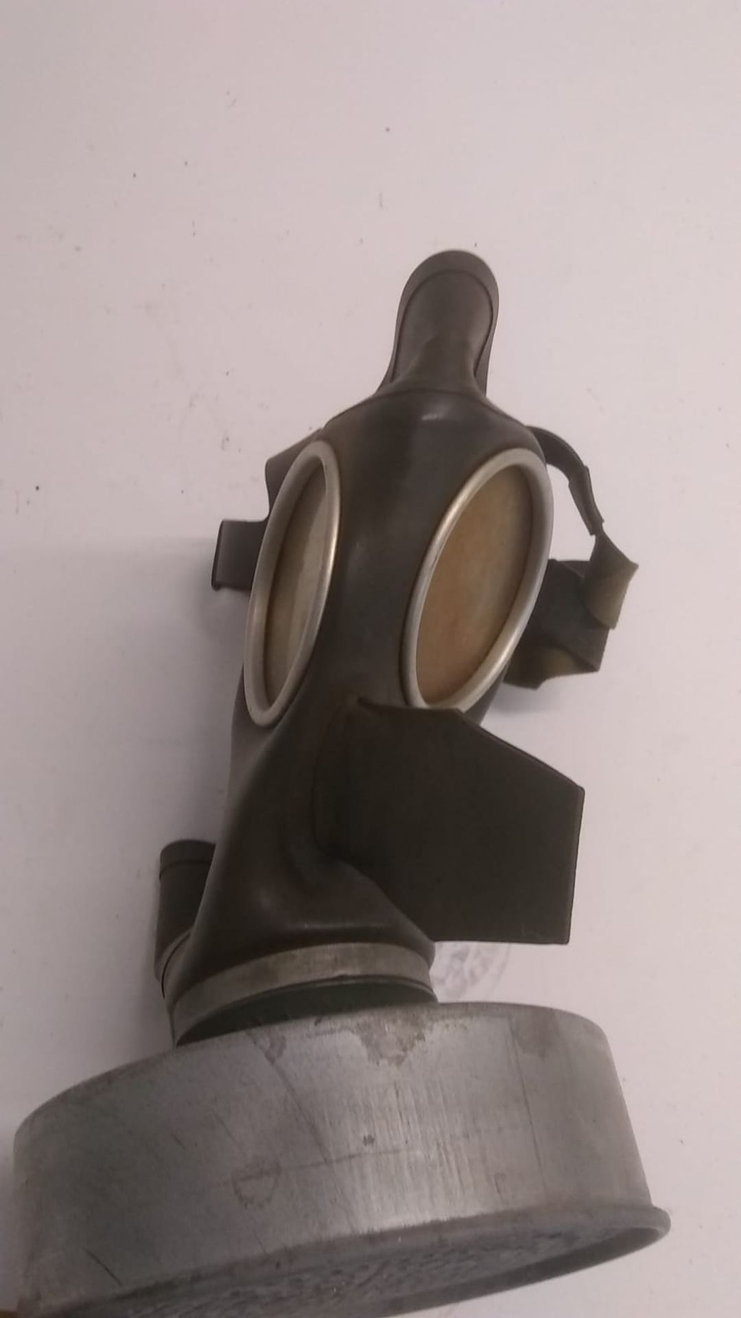 A WWII German Volksgasmaske (silver filter) gas mask, together with a rare East German MEDI gas mask - Image 4 of 9
