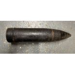 An inert WWII German 7.5cm projectile with fuse.