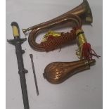 A quantity of militaria including dagger and scabbard, ram rod, powder flask and bugle.