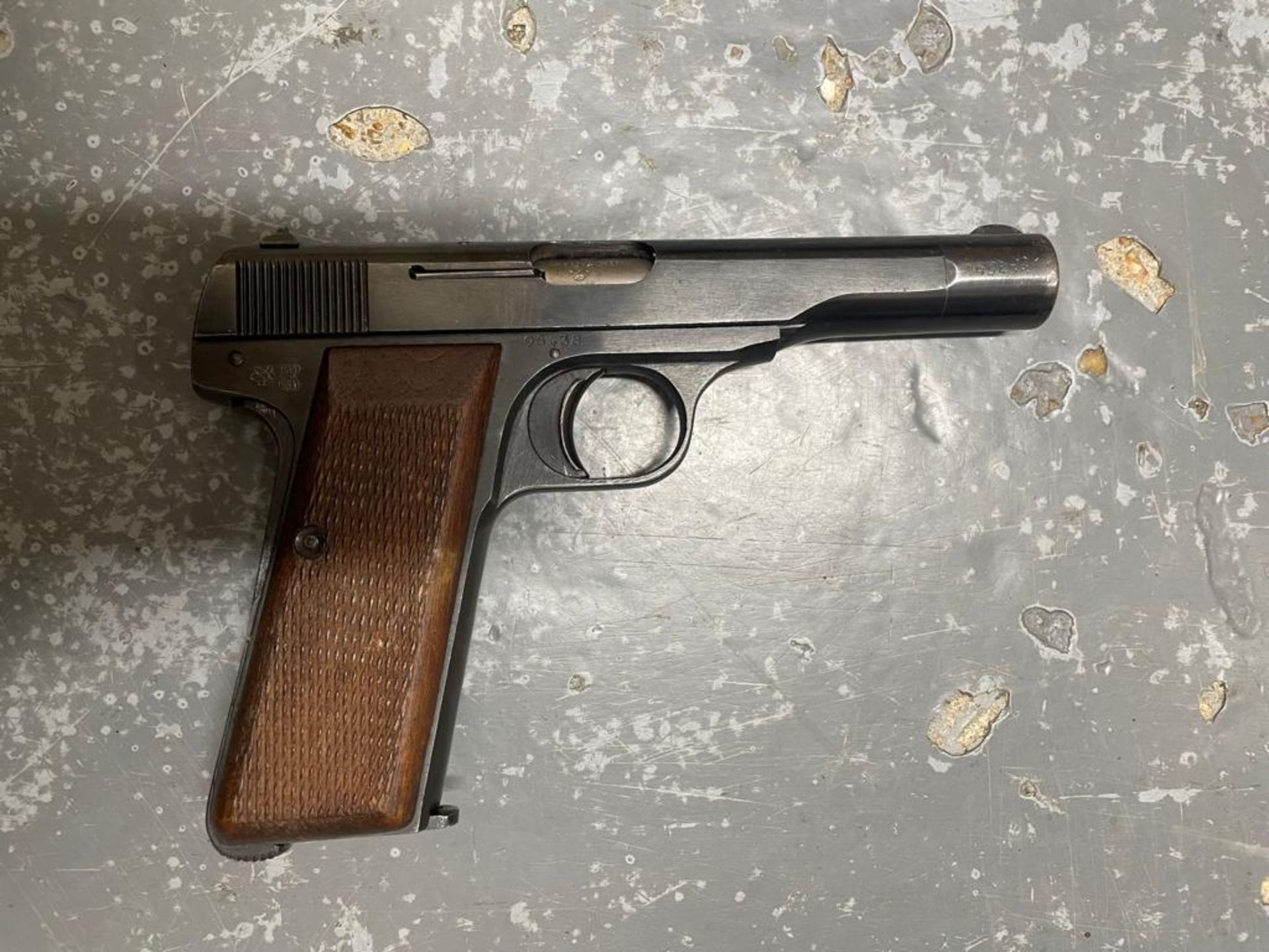 A deactivated WWII German pistol marked FN1922.