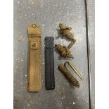 A quantity of assorted militaria inc, a WWII British entrenching tool handle with canvas holder,