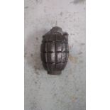 An inert WWI British mils grenade.