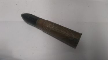 A WWI British 13pdr shell with flower th