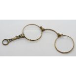 A delightful enamelled set of folding lorgnette glasses.