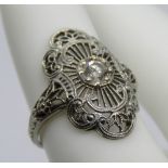 An Art Deco style 18ct white gold ring, central white stone, stamped 18k, size G-H, 2.4g.