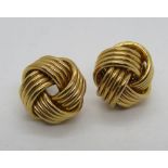 A pair of 9ct gold knot stud earrings, hallmarked 375, 3.3g.