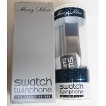 A limited edition Merry Silver Swatch twinphone, in original packaging.