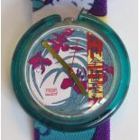 A limited edition Pop Swatch watch, Pleasure Garden, in original packaging, new battery within box.