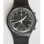A Chrono Swatch watch in Black Friday pattern, original packaging, new battery within bag.