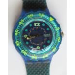 A Scuba 200 Swatch watch in Blue Moon pattern, original packaging, new battery within box.