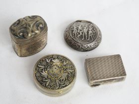 A sterling silver pill pot of rectangular form, together with three other assorted pill pots.