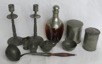 A quantity of assorted pewter items including a brown glass dimples bottle.