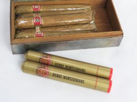 Cigars; a silver plated cigar box opening to reveal Henri Wintermans and King Edward