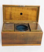 A 19th century mahogany tea caddy strung with boxwood and harewood, 30.5cm wide.