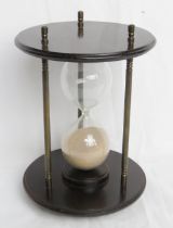 A contemporary oversized sand timer.