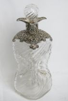 A delightful glug glug fluted glass bottle having hallmarked silver collar with pierced floral