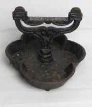 A cast iron boot scraper.