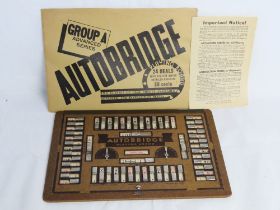 Autobridge playing board with instructions.