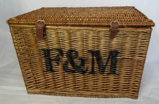 A large coffee table type Fortnum & Masons wicker hamper.