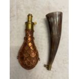 A copper powder flask and a horn powder