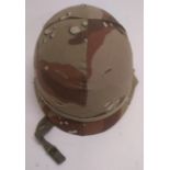 A US M1 helmet with chocolate chip camo