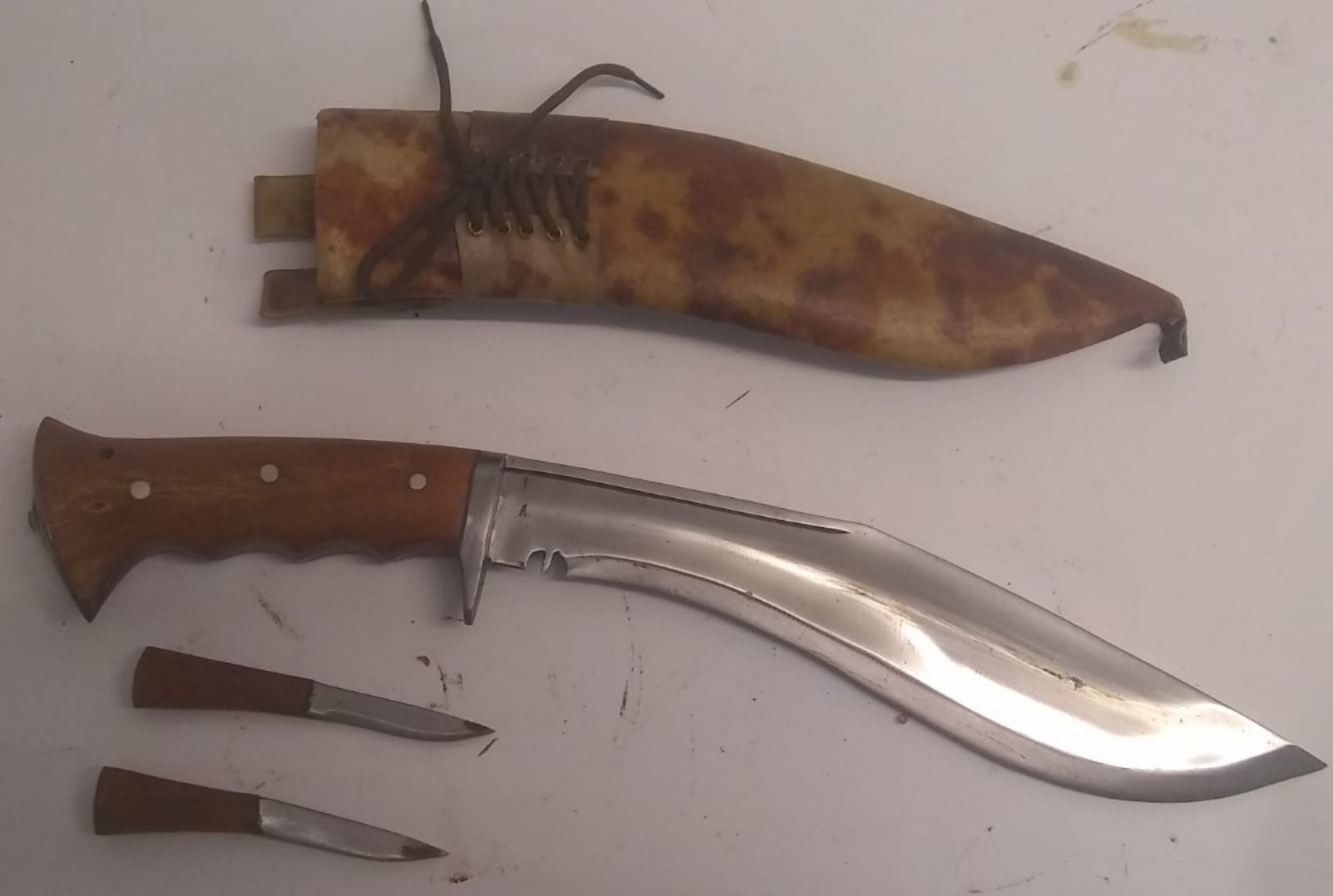 A modern Kukri knife and two support kni