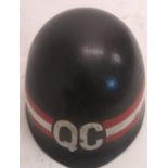 A US M1 QC helmet with Vietnamese Police